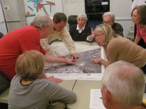 Vinings residents pore over a map of their community at the second meeting of the Vinings Vision Plan. Credit Hunt Archbold.