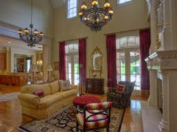 4235_Regency_Court_Atlanta_LivingRoom The family room is open to the top-of-the line kitchen in this Buckhead home sold by Tina Hunsicker.