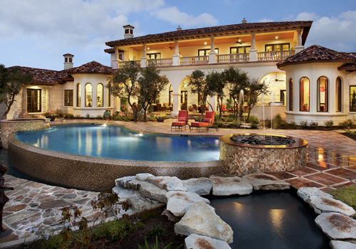 Neo-Mediterranean home styles are becoming the Sun Belt standard.  The Southern European style and materials work well in warmer climates and match the landscape. 